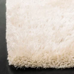 Annmarie Solid Tufted Rug - Safavieh